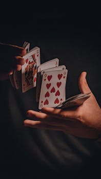 people playing cards on smart device