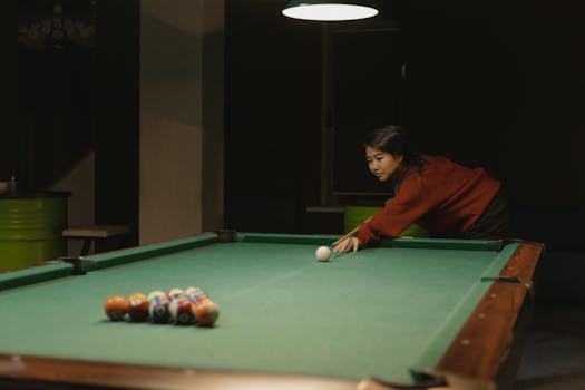 gambler playing slots on mobile device